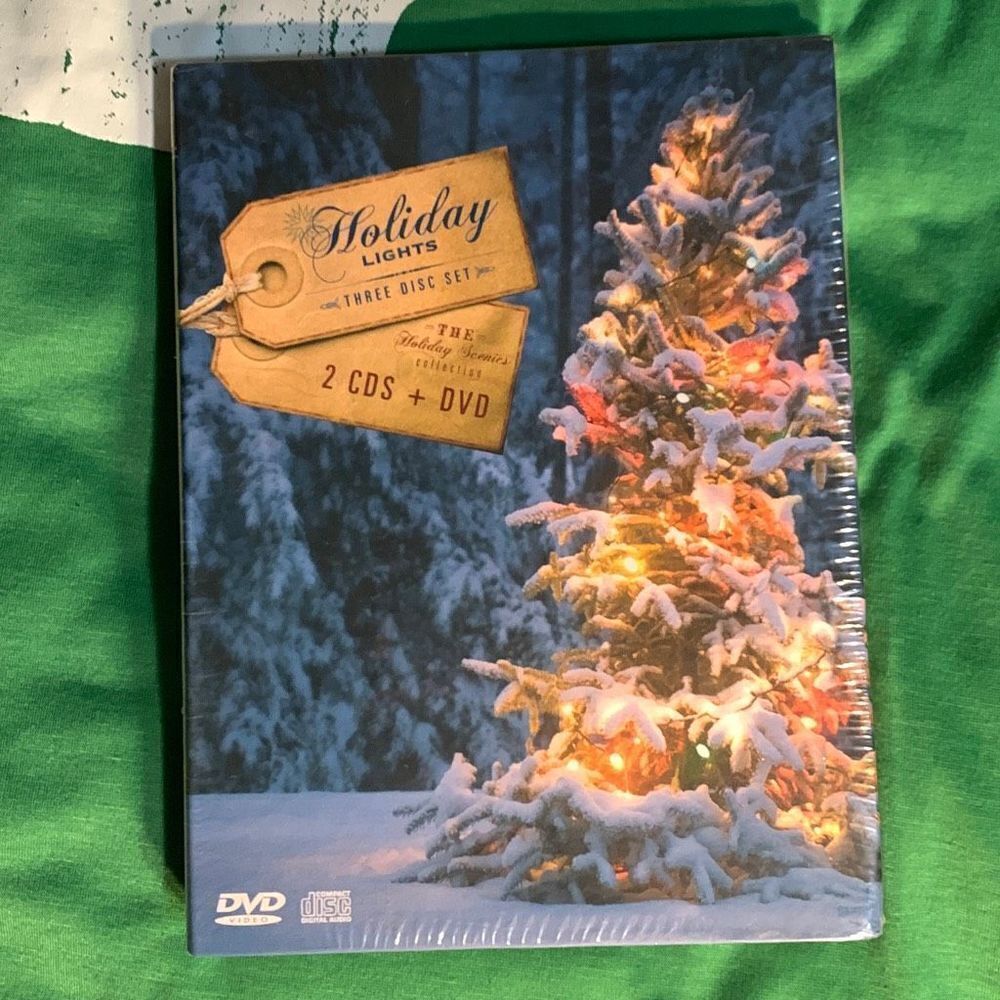 Holiday Lights 3 disc set.  2cds+1dvd New